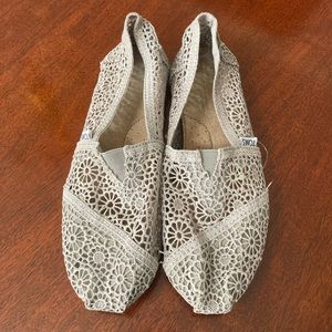 Toms silver/gray crochet slip-ons.